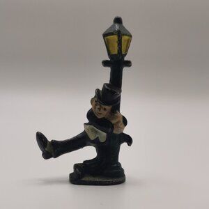 Vintage Cast Iron bottle opener, Figure, Man Holding On Lamppost, 4.25"x2"